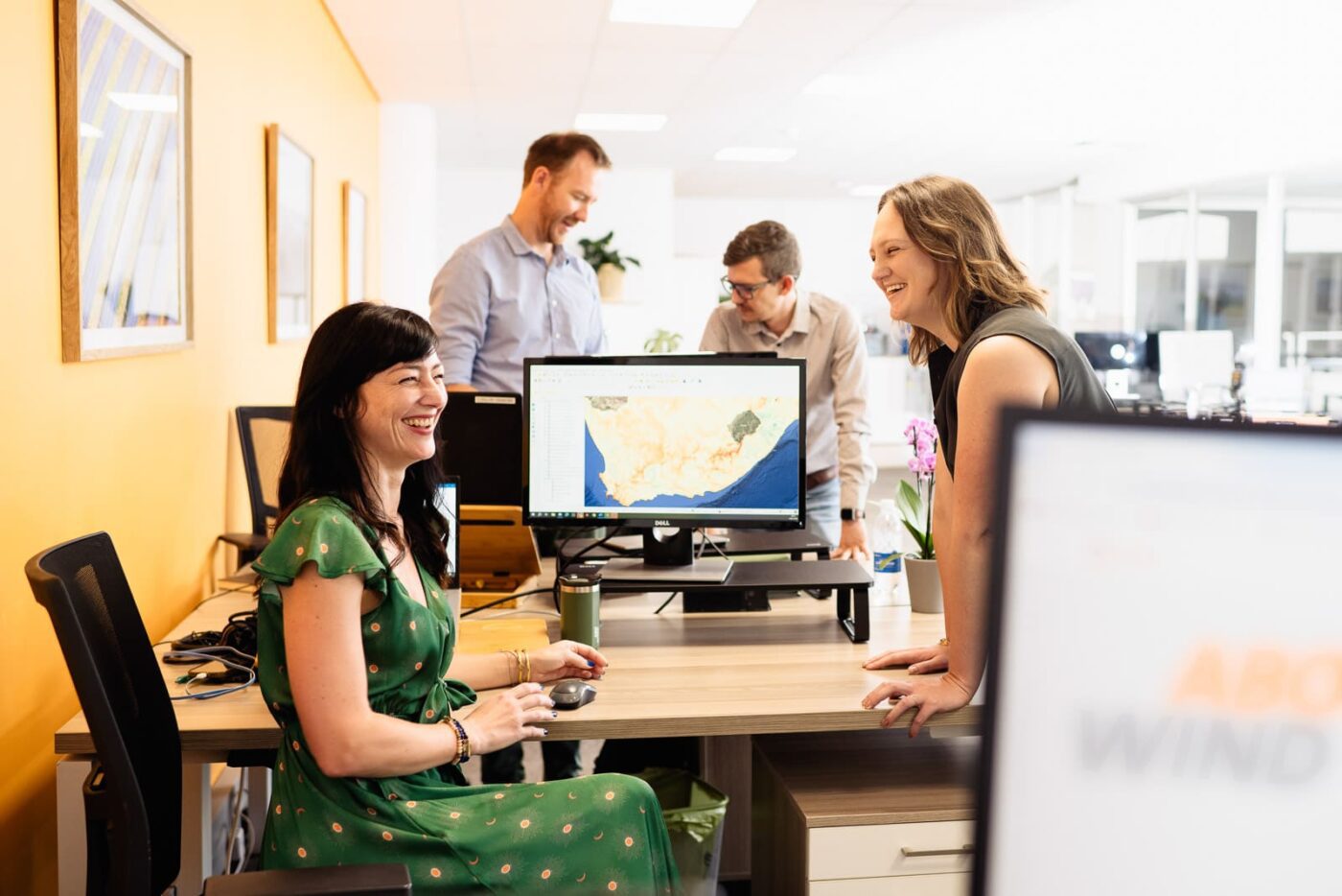 colleagues interacting in corporate photo shoot